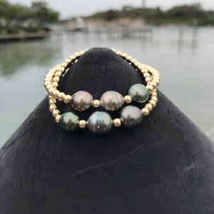 
            
                Load image into Gallery viewer, Gold Triple Tahitian Bora Bracelet
            
        